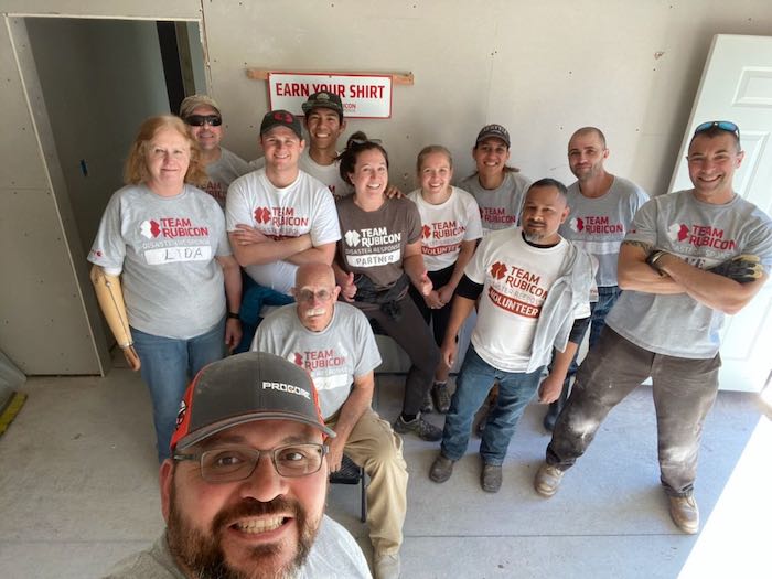 Caroline Beightol of Procore, and her team of "Greyshirts" from Team Rubicon