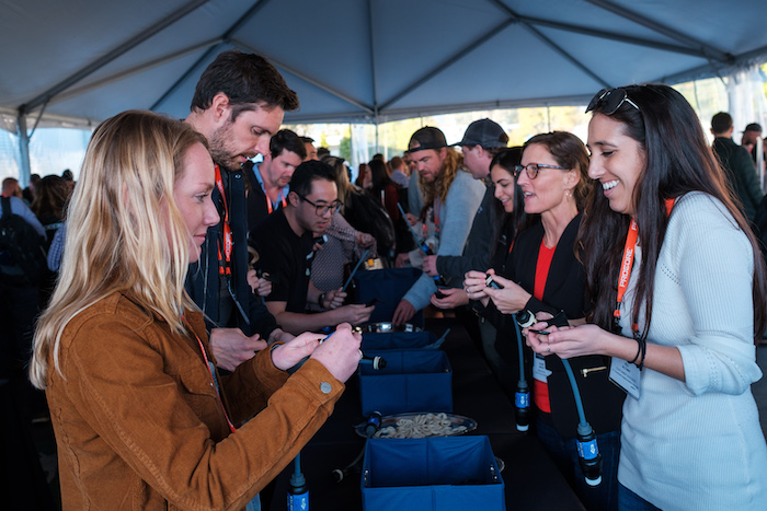 Procore employees volunteer with Wine To Water